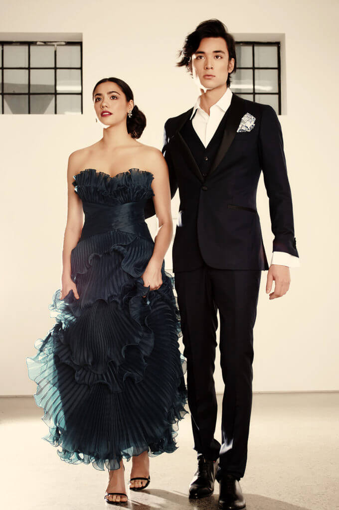 Mikayla wears Modes Pronovias dress P.O.A, Modes Crystal Clip Earrings $198, Stuart Weitzman ‘Song’ Sandal exclusive to Scarpa $590. Matt wears MJ Bale Saunders Jacket $769, MJ Bale Saunders Trouser $299, MJ Bale Jamie Blue Hankie $59.95, Rembrandt Black Leather Whole-Cut shoes $399.