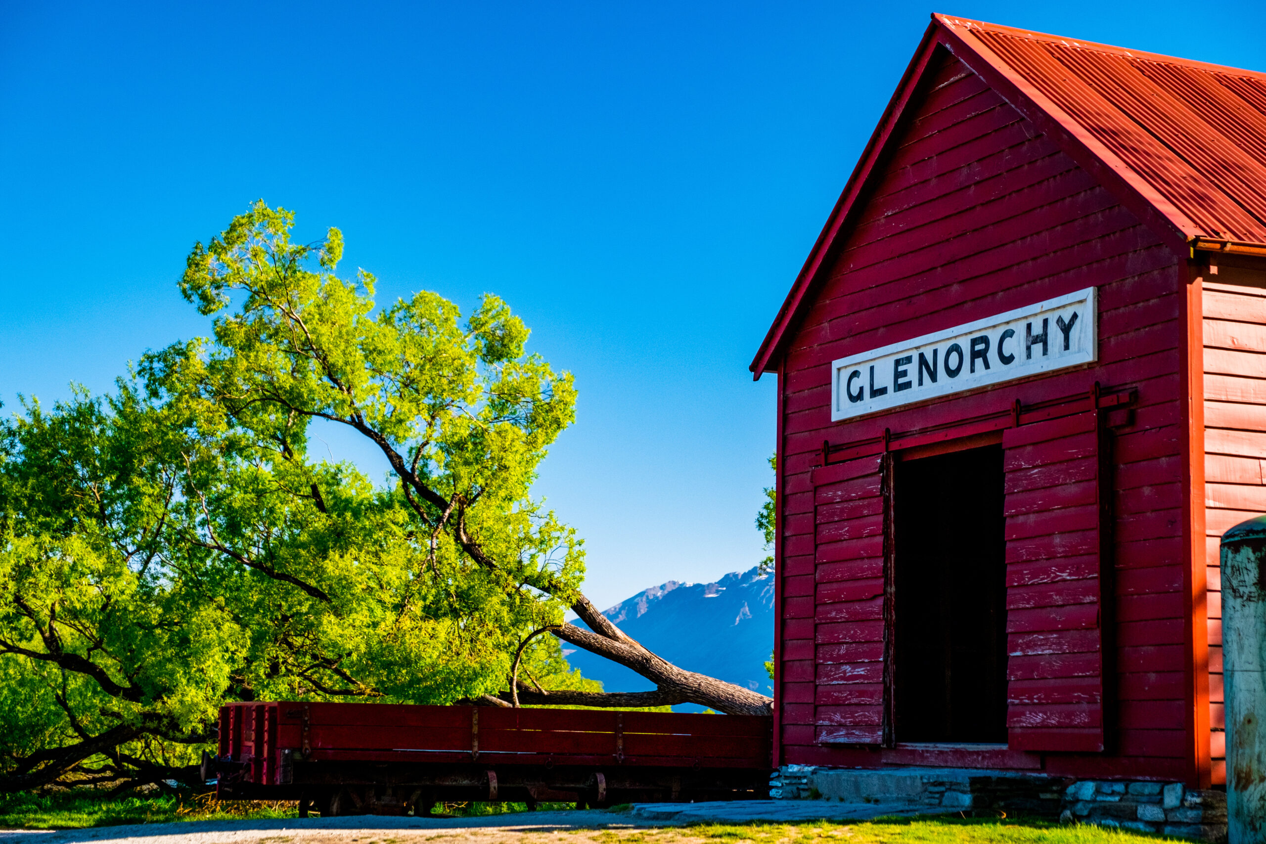 Iconic red building and Beautiful scenery beside the lake at Glenorchy, New Zealand.