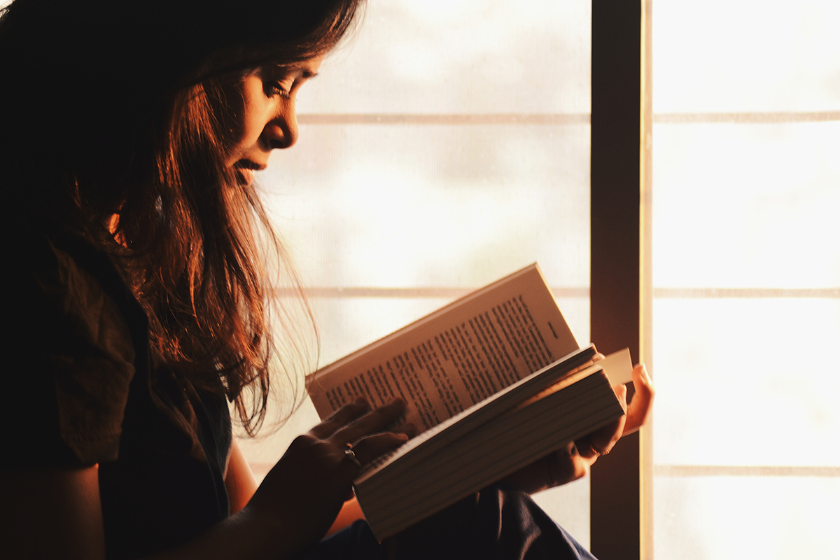 on the bookshelf - girl reading