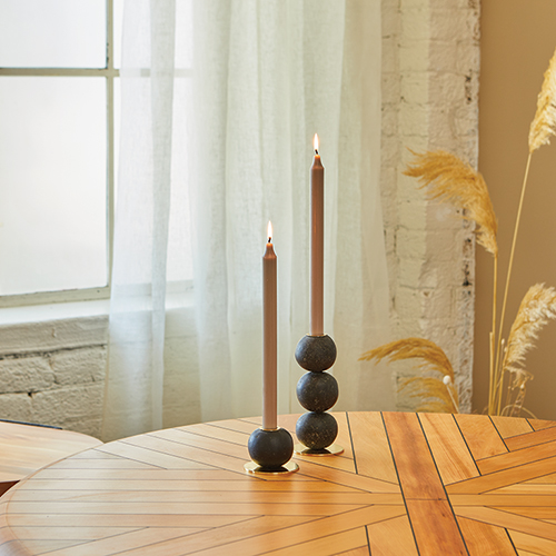 DANCEOFGEOMETRY Candelabras sitting on the BLACKTREEFERN Round Dining Table